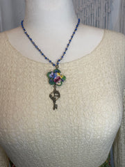 Porcelain Pansy Cluster With a Key Dangle Necklace by Gina