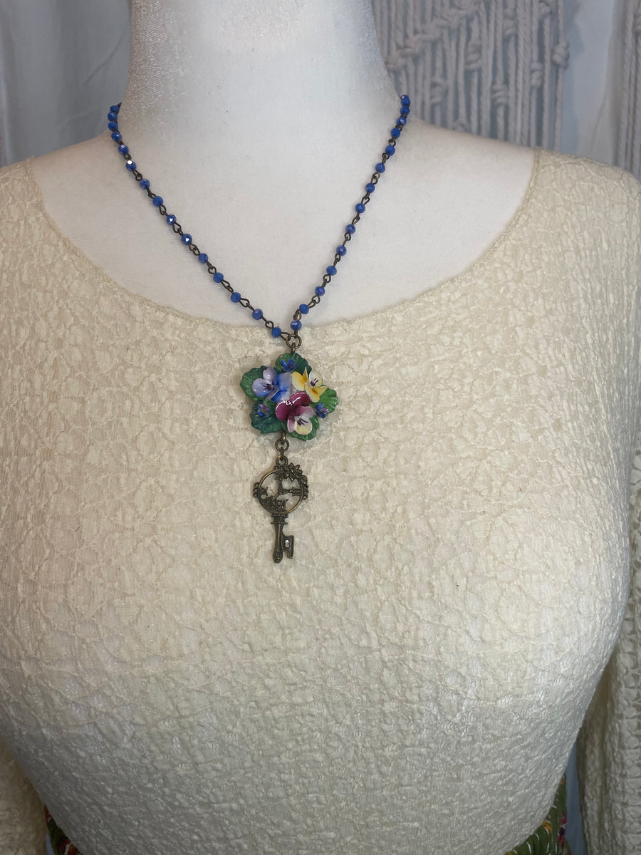 Porcelain Pansy Cluster With a Key Dangle Necklace by Gina