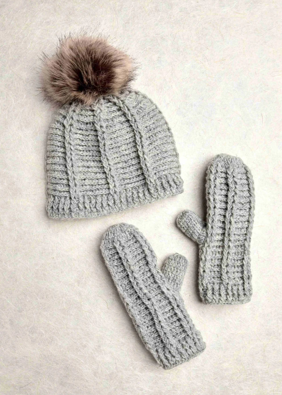 Brecken Pumice Knit Pom Beanie By Many Hands