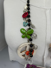 Purple Stingin’ Punch Buggy Necklace by Gina