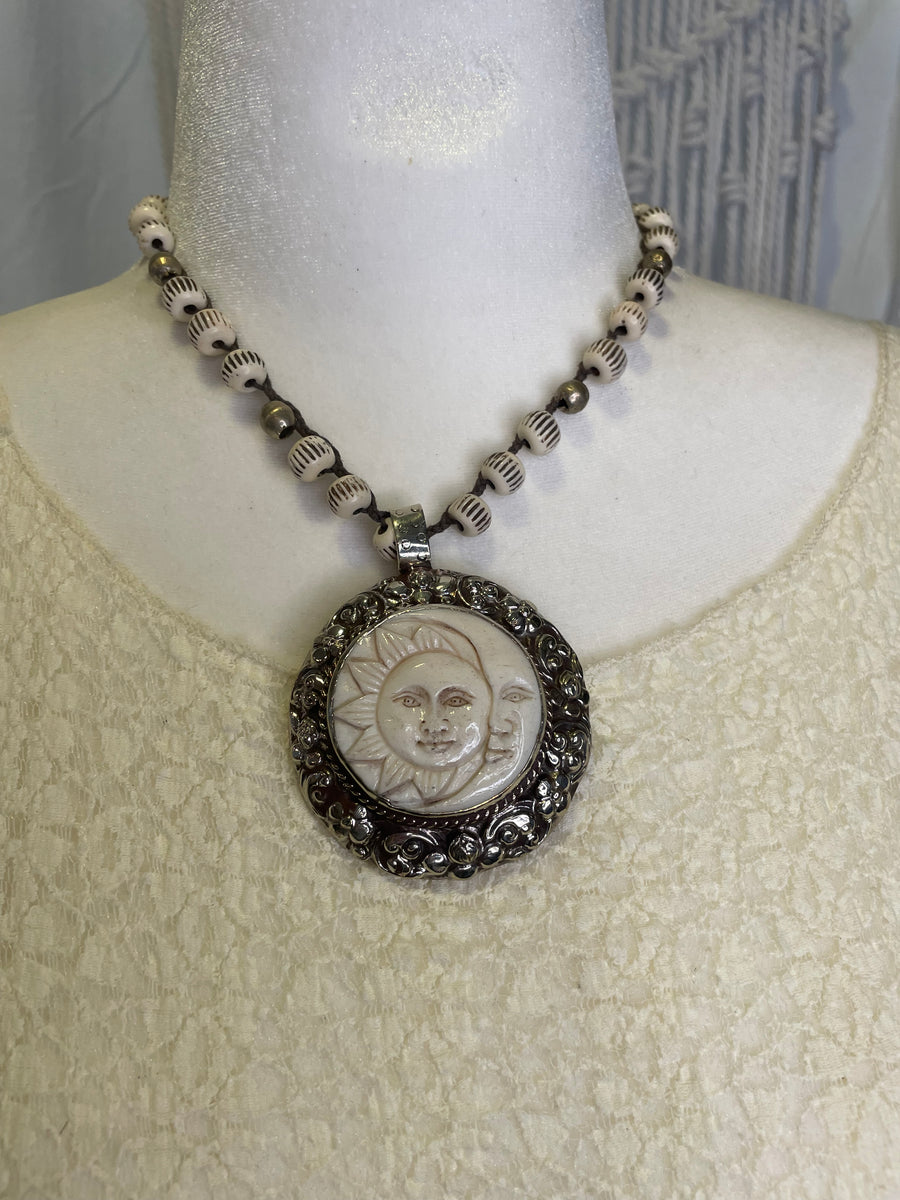 Celestial Faces Carved in Bone Necklace by Tara Gasparian