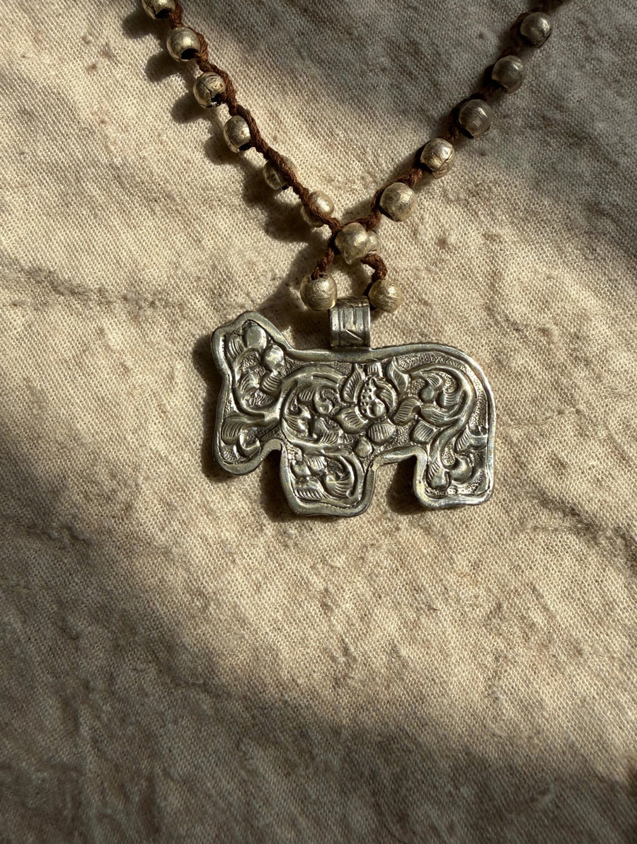 Desert Story Carved Bone Donkey Necklace by Tara Gasparian