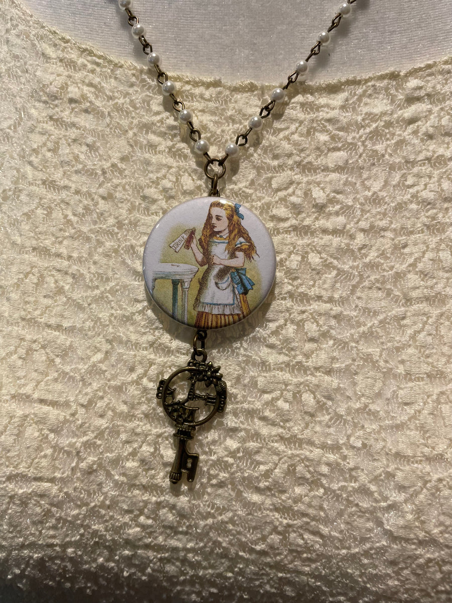 Drink Me Button Necklaces by Gina