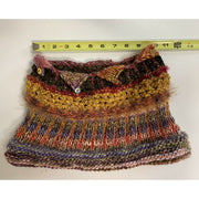 Horizontal length of hand made rust tone scarf (2.) in various textures