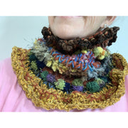 5. Chenille edged handknit scarf with lots of texture in color and stitches