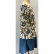 Blue Floral repurposed top into a new tunic size Large. The neckline has snaps to hold in place. The fabric on the bottom is new polyester. - Robin Boutique-Boutique    &.  Reloved Fabrics