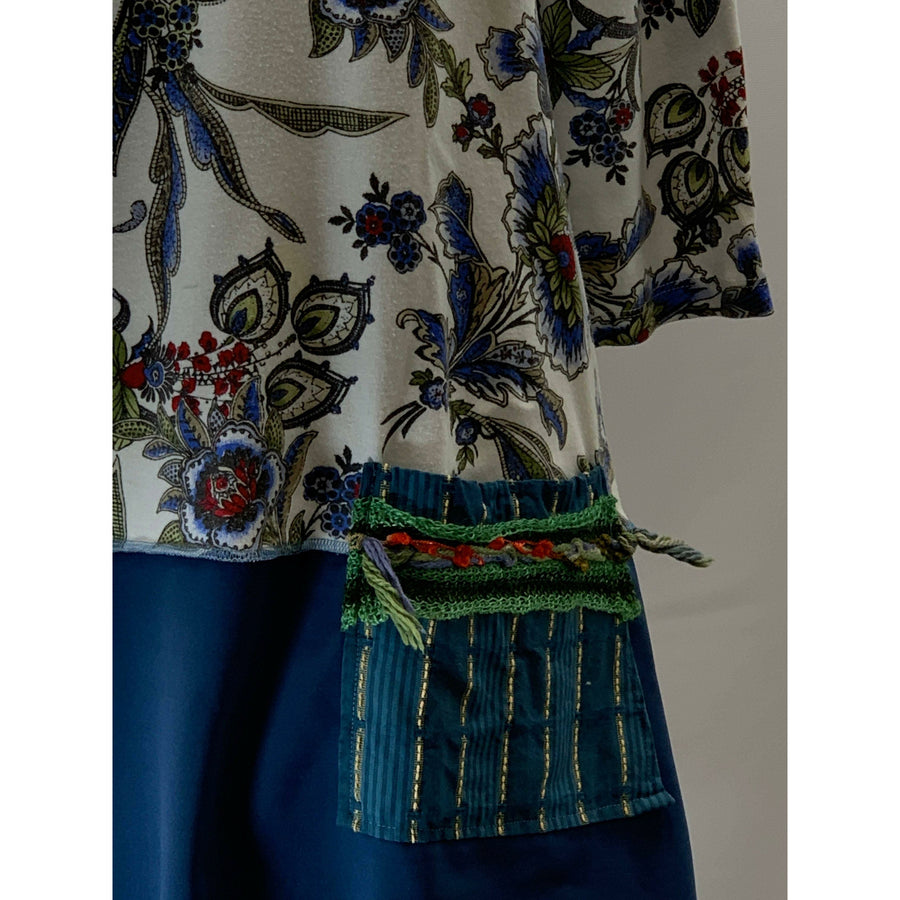 Blue Floral repurposed top into a new tunic size Large. The neckline has snaps to hold in place. The fabric on the bottom is new polyester. - Robin Boutique-Boutique    &.  Reloved Fabrics