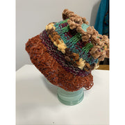 hand knit scarf (1.)  in many textures with a turquoise accent